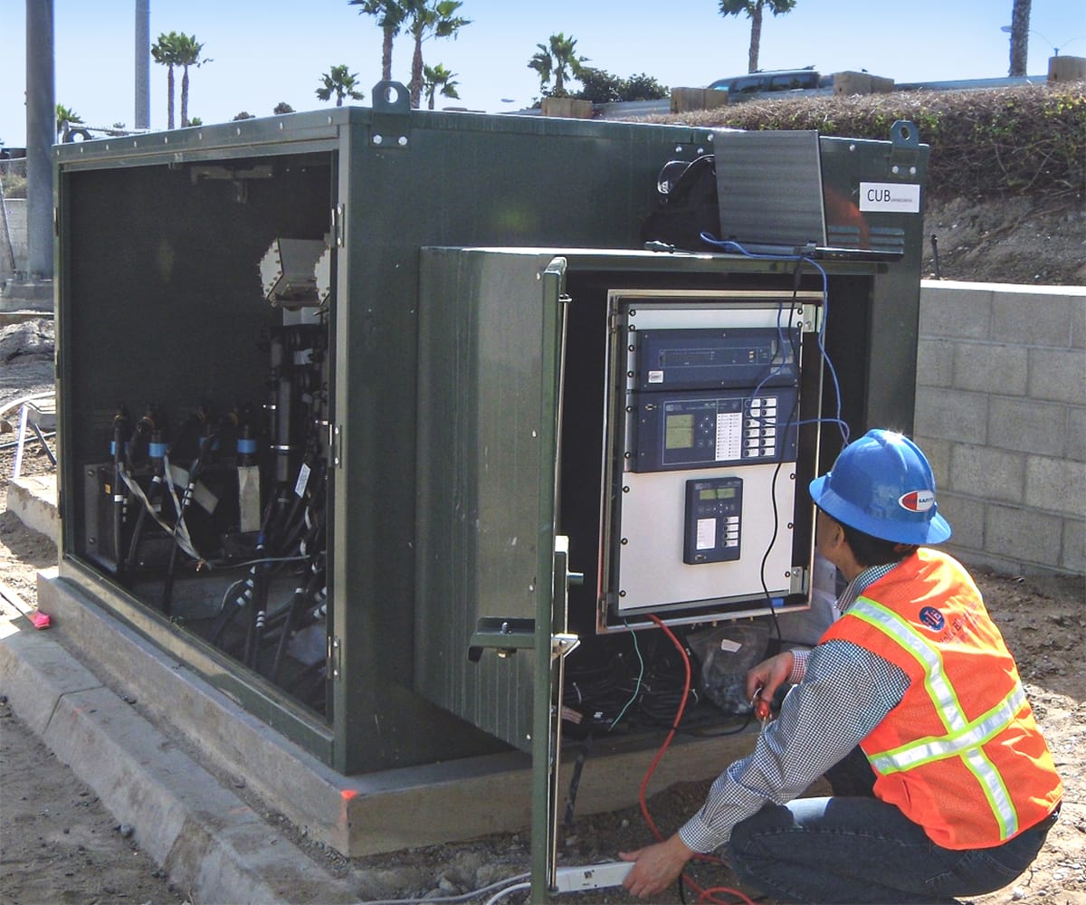 An engineer testing a switch.